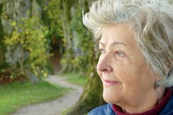 Older woman looking into the distance